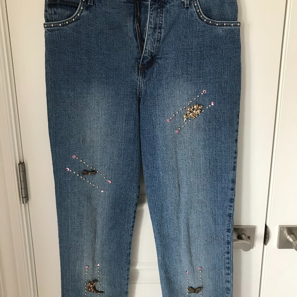 Cropped jeans with vintage costume jewelry pins